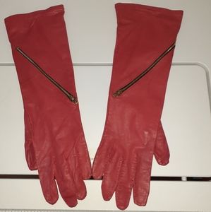 Elbow length red leather gloves
